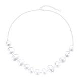 Full view of Svetozar sterling silver disc necklace with a fine chain and adjustable clasp