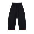 Black MIROLYUB wide-leg drawstring pants with red hem lettering, front view.