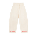 Cream MIROLYUB wide-leg drawstring pants with red hem lettering, front view.