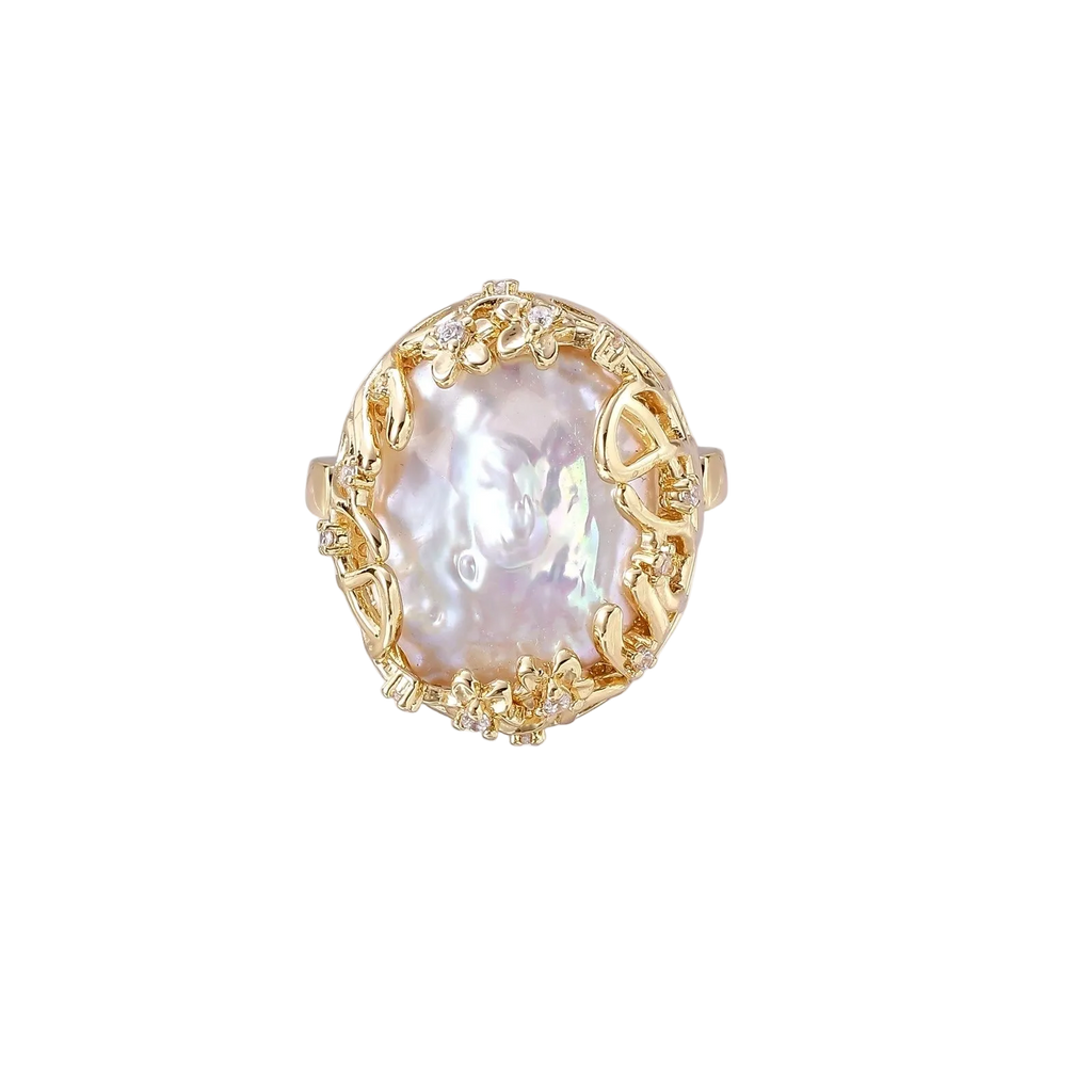 Top view of Vladislava ring showing the oval baroque pearl surrounded by gold-plated branches and clear crystal flowers