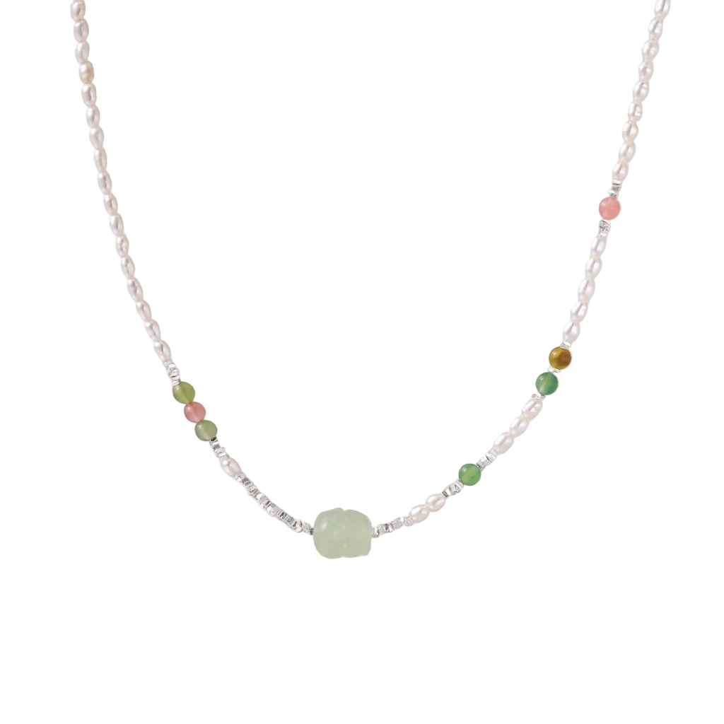 Zdravka necklace front detail with freshwater pearls, green and pink stone beads and a pale green carved centre
